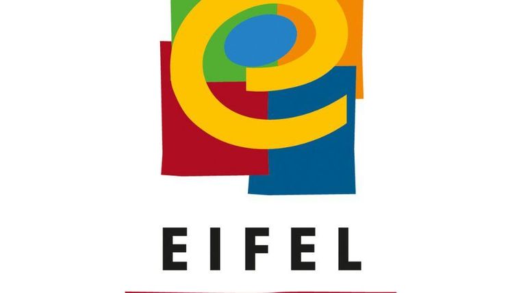 Een kleurrijk logo met geometrische vormen en de tekst „EIFEL PRODUCENT“. De kleuren zijn levendig en aantrekkelijk.