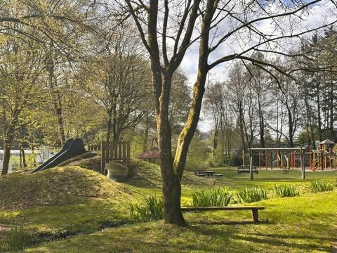 The playground is shown from a greater distance.